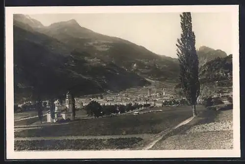 AK Poschiavo, Ortsansicht mit Bergpanorama