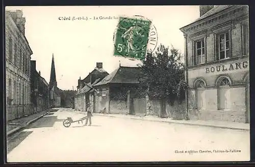 AK Cléré, La Grande Rue avec boulangerie et église au fond