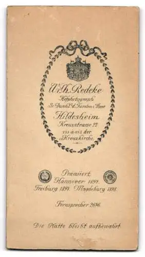 Fotografie Wilh. Redeke, Hildesheim, Kreuzstrasse 22, Elegantes Paar im Atelier