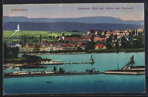 AK Konstanz, Blick auf Hafen und Seestrasse, Im Hintergrund Bismarckturm