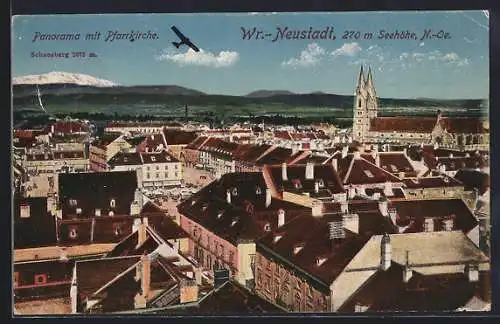 AK Wr. Neustadt, Panorama mit Pfarrkirche, Flugzeug