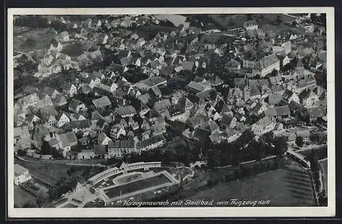 AK Herzogenaurach, Teilansicht mit Stadtbad, Fliegeraufnahme