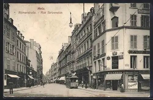 AK Metz, Römerstrasse mit Geschäften und Strassenbahn