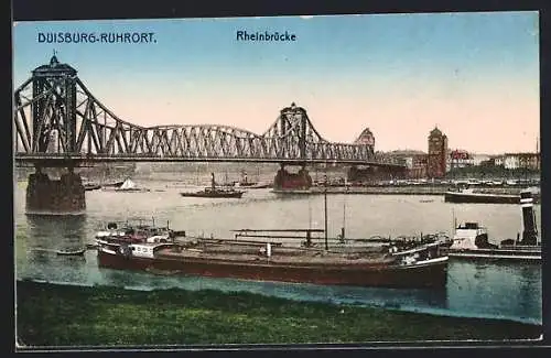 AK Duisburg-Ruhrort, Dampfer passiert die Rheinbrücke, Lastschiff