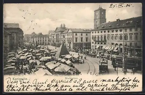 AK Karlsruhe, Marktplatz mit Geschäft und Strassenbahn