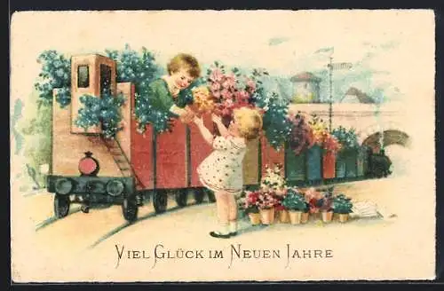 AK Neujahrsgruss, Kinder beladen einen Zug mit Blumen