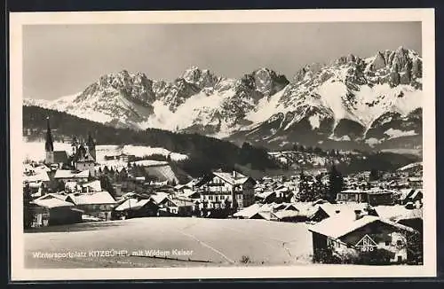 AK Kitzbühel, verschneite Stadtansicht mit dem Wilden Kaiser