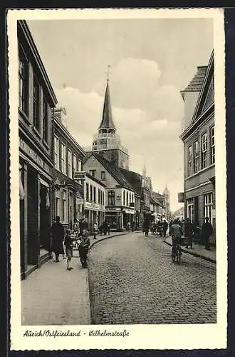 AK Aurich /Ostfriesland, Wilhelmstrasse mit Geschäften