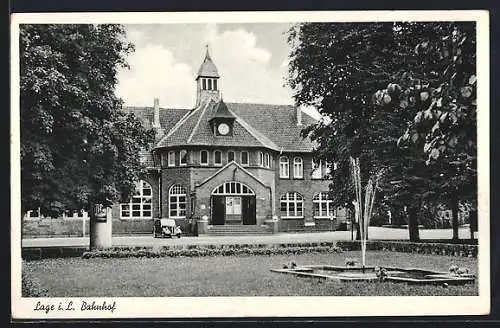 AK Lage / Lippe, Eingang zum Bahnhof und Parkanlagen