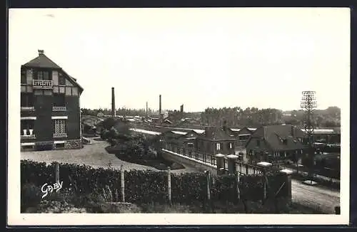 AK Rugles, Vue des Tréfileries du Havre et maisons environnantes