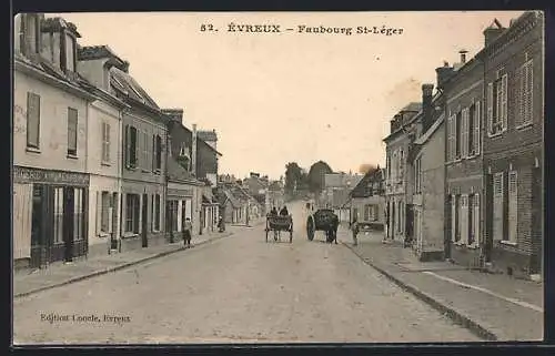 AK Évreux, Faubourg St-Léger avec voitures à cheval