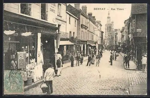 AK Bernay, rue Thiers animée avec commerces et passants