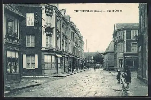 AK Thiberville, Rue d`Orbec avec passants et bâtiments historiques