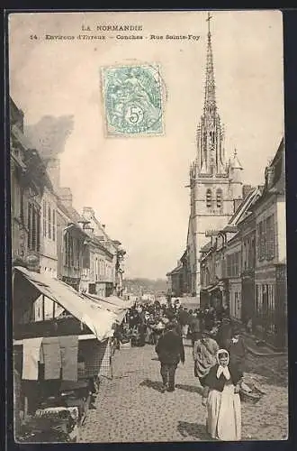 AK Conches, Rue Sainte-Foy avec église et marché animé