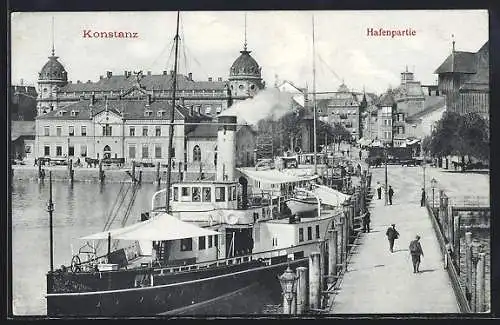 AK Konstanz, Partie am Hafen mit angelegtem Passagierdampfer