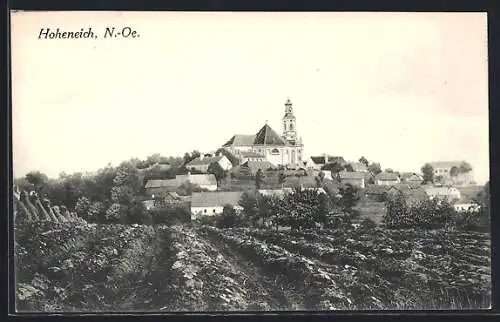 AK Hoheneich /N.-Ö., Ortspanorama mit Kirche von einem Acker aus