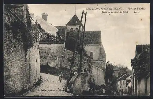 AK Montigny-sur-Loing, Vue sur l`Église prise de la Rue de Grez