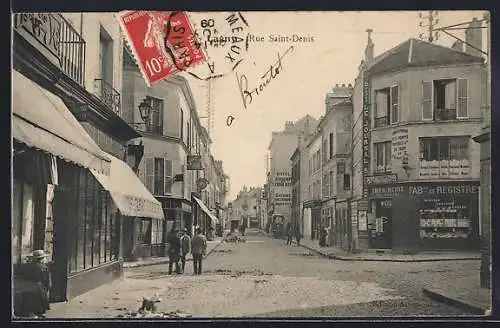 AK Lagny, Vue de la Rue Saint-Denis avec passants et commerces