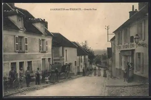 AK Dammartin-sur-Tigeaux, Grande Rue animée avec habitants et charrette