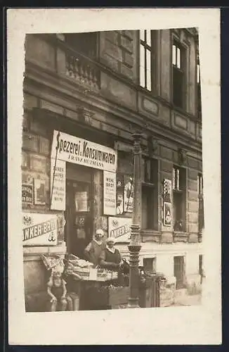 Foto-AK Spezerei und Konsumwaren Franz Hutmann, Emailleschild-Reklame für Anker-Brot