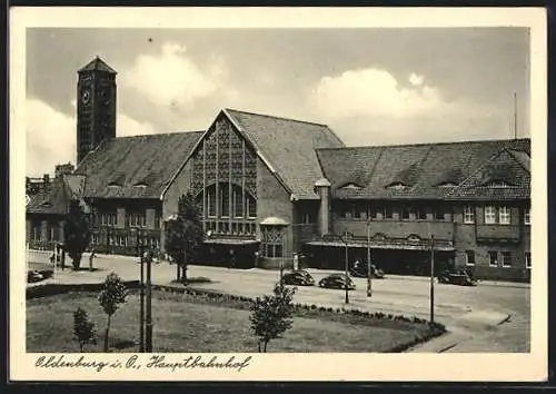 AK Oldenburg i. O., Blick auf den Eingang des Hauptbahnhofes, VW Käfer