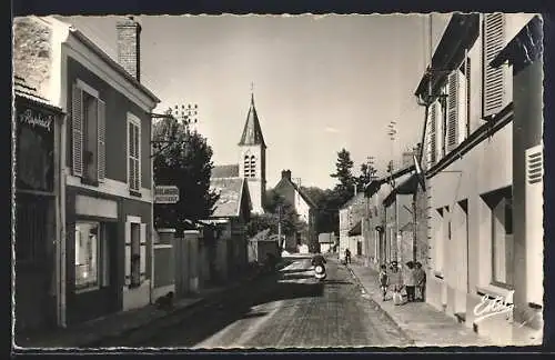 AK Auffargis, La Grande Rue avec l`église et les enfants jouant dans la rue