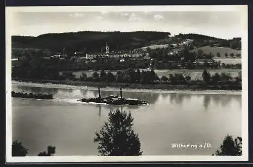 AK Wilhering an der Donau, Ortsansicht über den Fluss hinweg mit der Zisterzienserabtei u. Seitenraddampfer