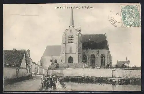 AK Aelis, L`Église et le canal avec des villageois