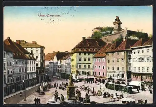 AK Graz, Hauptplatz mit Geschäften, Denkmal und Strassenbahn