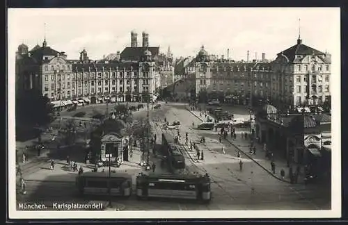 AK München, Strassenbahnen auf dem Karlsplatzrondell aus der Vogelschau