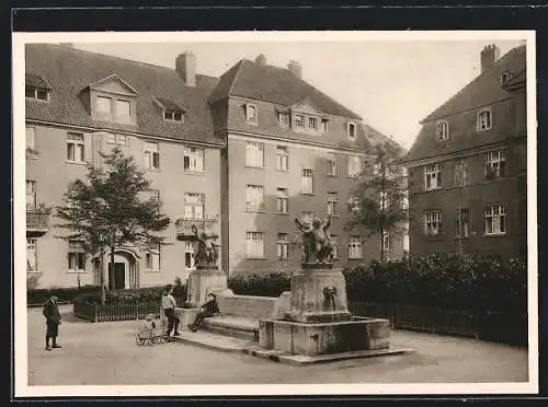 AK Essen / Ruhr, Strassenpartie mit Brunnen in der Siedlung Alfredshof