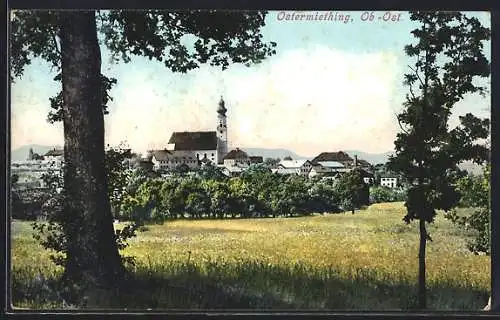 AK Ostermiething /Ob.-Öst., Teilansicht mit Kirche