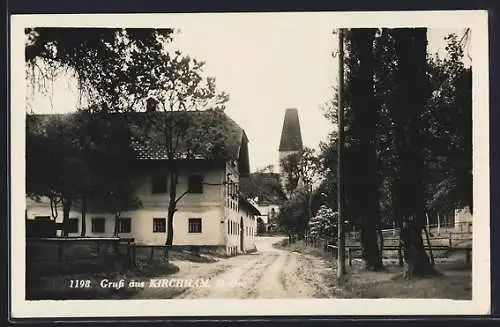 AK Kirchham /O.-Oe., Strassenpartie mit Kirche