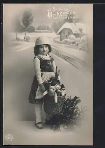 AK Kleines Mädchen mit Teddy im Korb im Schnee, Weihnachtsgruss