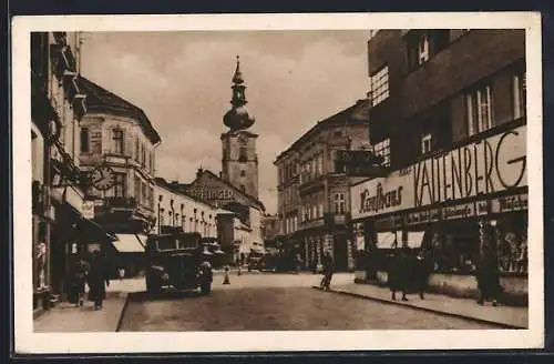 AK Wels, Bismarckgasse und Pfarrgasse mit Geschäften