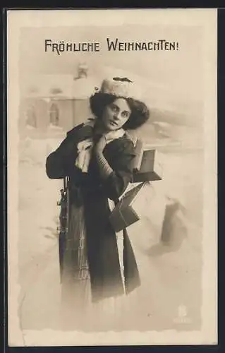 Foto-AK L.J. & F.F. Nr. 4032 /5: Frau mit Paketen im Winter, Weihnachtsgruss