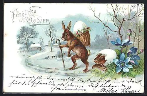 AK Osterhase trägt ein Ei im Korb durch den Schnee