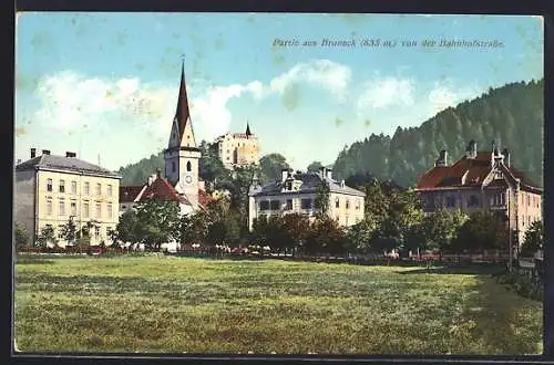 AK Bruneck, Ortspartie mit Kirche von der Bahnhofstrasse