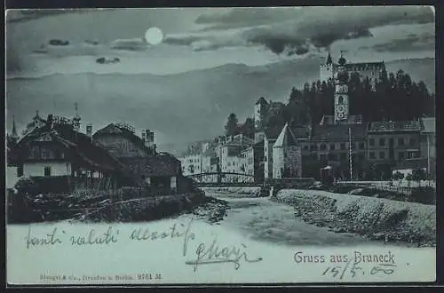 Mondschein-AK Bruneck, Panoramablick auf Ort mit Brücke und Burg