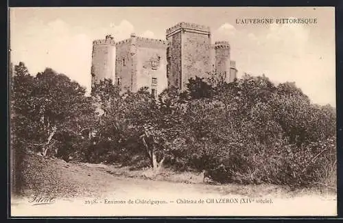 AK Chazeron, Château du XIVe siècle entouré de végétation luxuriante