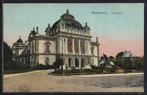 Goldfenster-AK Rendsburg, abendliche Stadthalle mit leuchtenden Fenstern