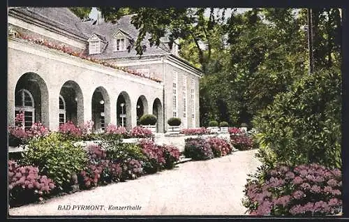 AK Bad Pyrmont, Konzerthalle mit blühendem Rhododendron