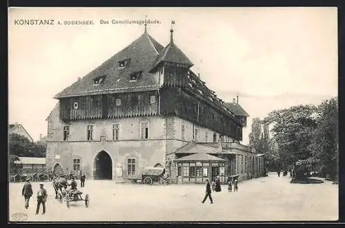 AK Konstanz, Das Conciliumsgebäude mit Leuten und Pferdefuhrwerk