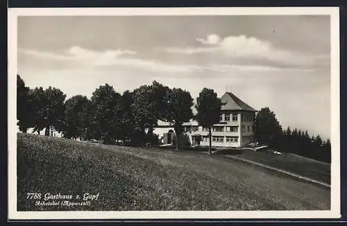 AK Rehetobel, Gasthaus z. Gupf J. Oertle, gesehen von einem Hang aus