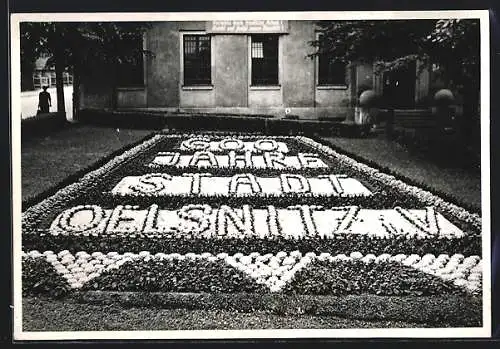 Foto-AK Oelsnitz i. V., Inschrift aus Blumen 600 Jahre Stadt Oelsnitz