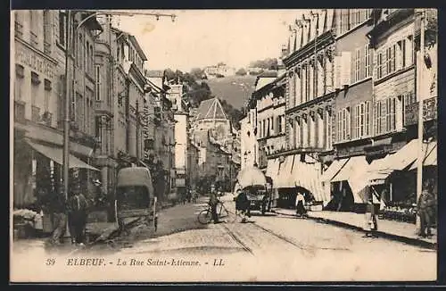 AK Elbeuf, La Rue Saint-Étienne animée avec passants et boutiques