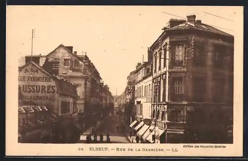 AK Elbeuf, Rue de la Barrière avec bâtiments et enseignes commerciales