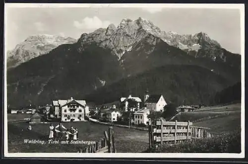 AK Waidring, Ortsansicht mit Steinbergen