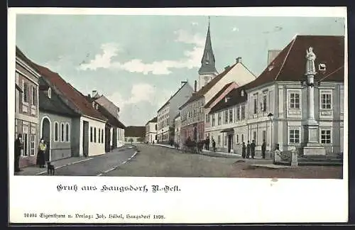 AK Haugsdorf /N.-Öst., Strassenpartie mit Denkmal