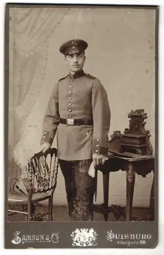 Fotografie Samson &amp Co., Duisburg, Königstr. 38, Portrait Soldat in Uniform mit Schirmmütze